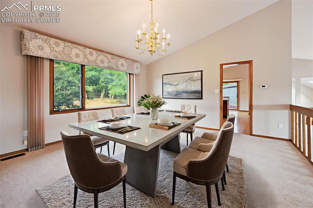 635 Royal Oak Drive Colorado Springs, CO 80906 - Photo 7 of 47 a view of a dining room with furniture window and outside view