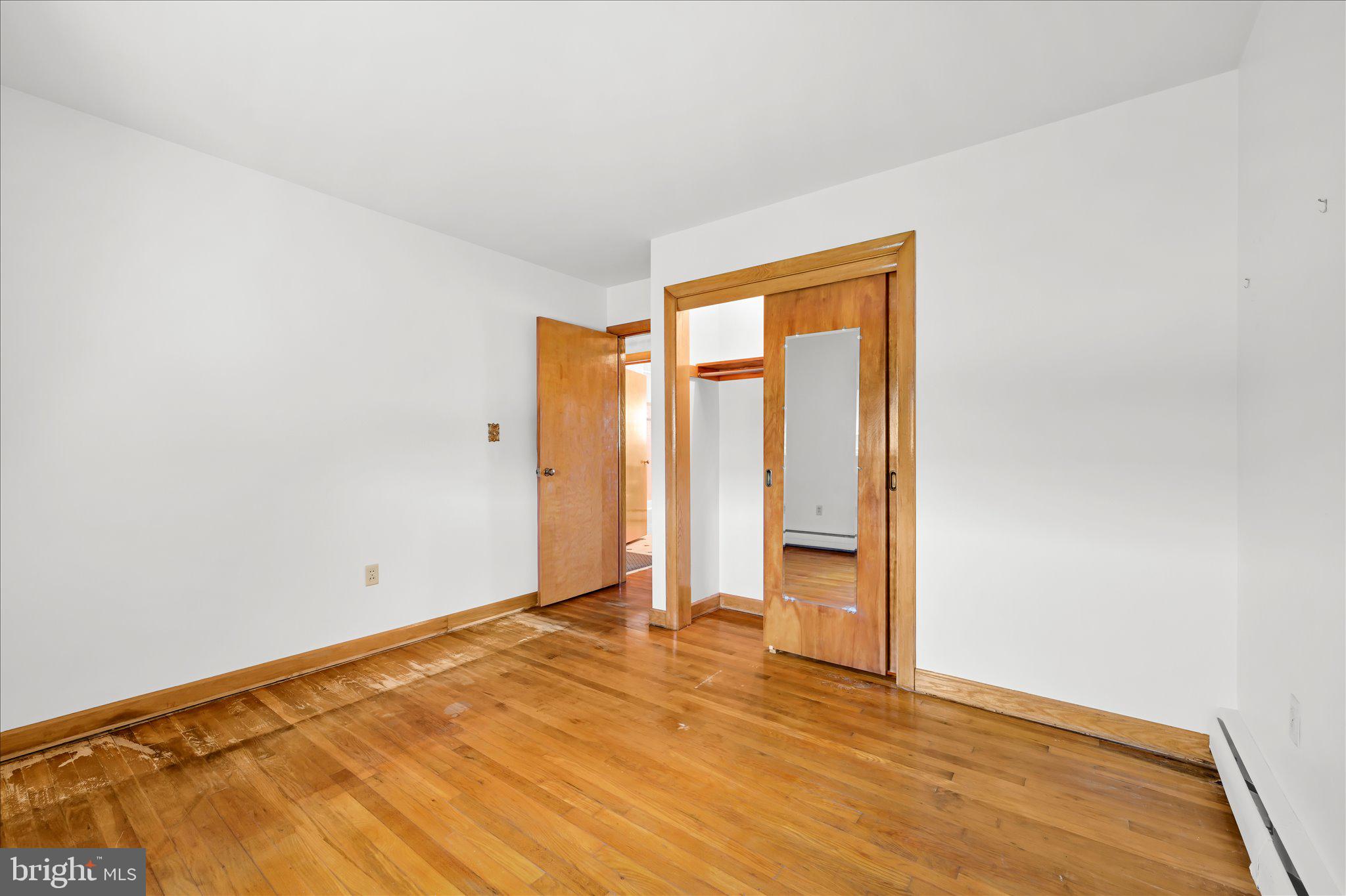 214 West Maple Street Valley View, PA 17983 - Photo 18 of 36 a view of an empty room with wooden floor