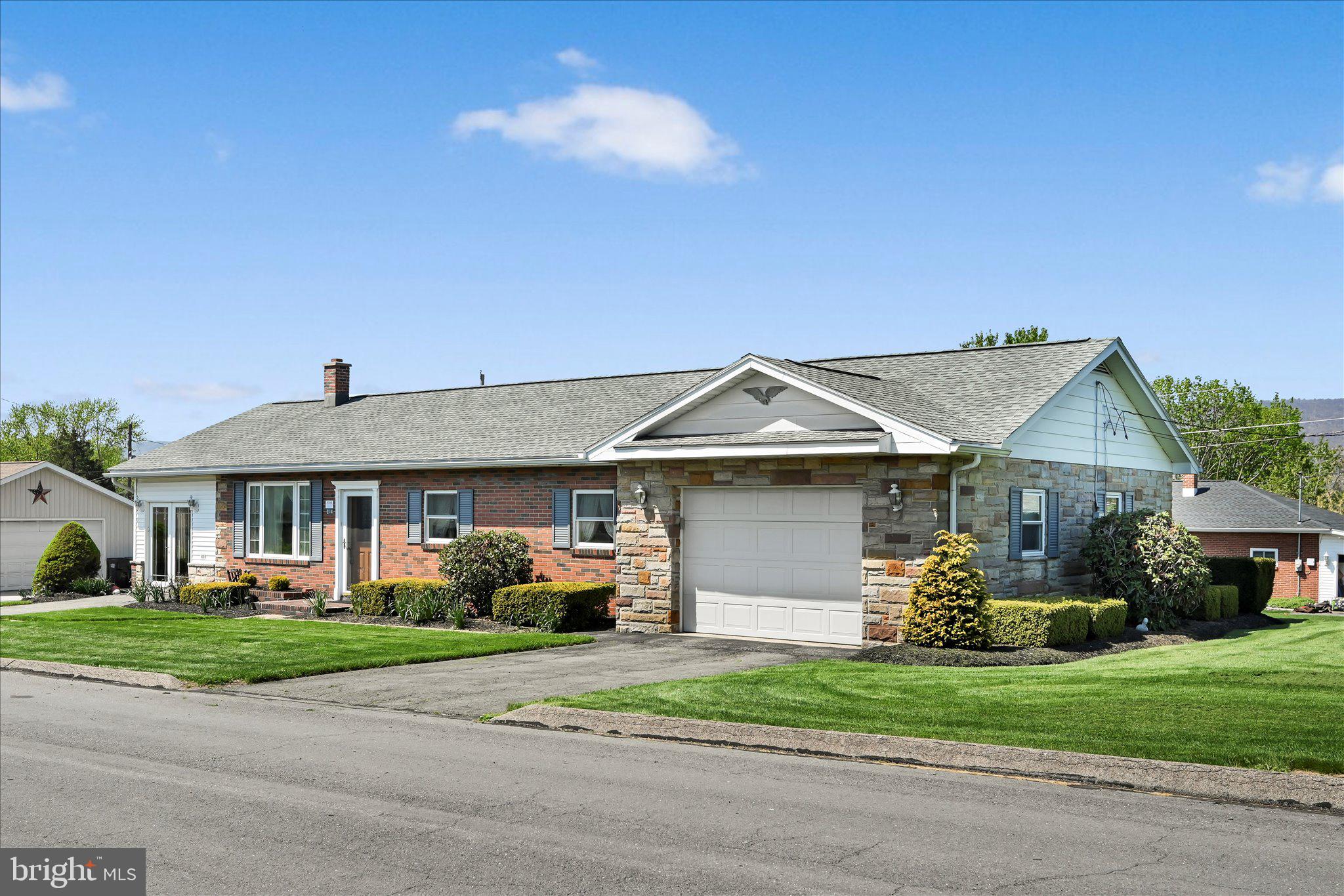 214 West Maple Street Valley View, PA 17983 - Photo 4 of 36 a front view of a house with a yard