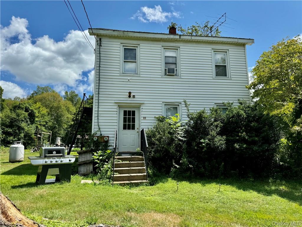 19 Bloomingburg Road Middletown, NY 10940 - Photo 2 of 20 a view of a house with backyard and a garden