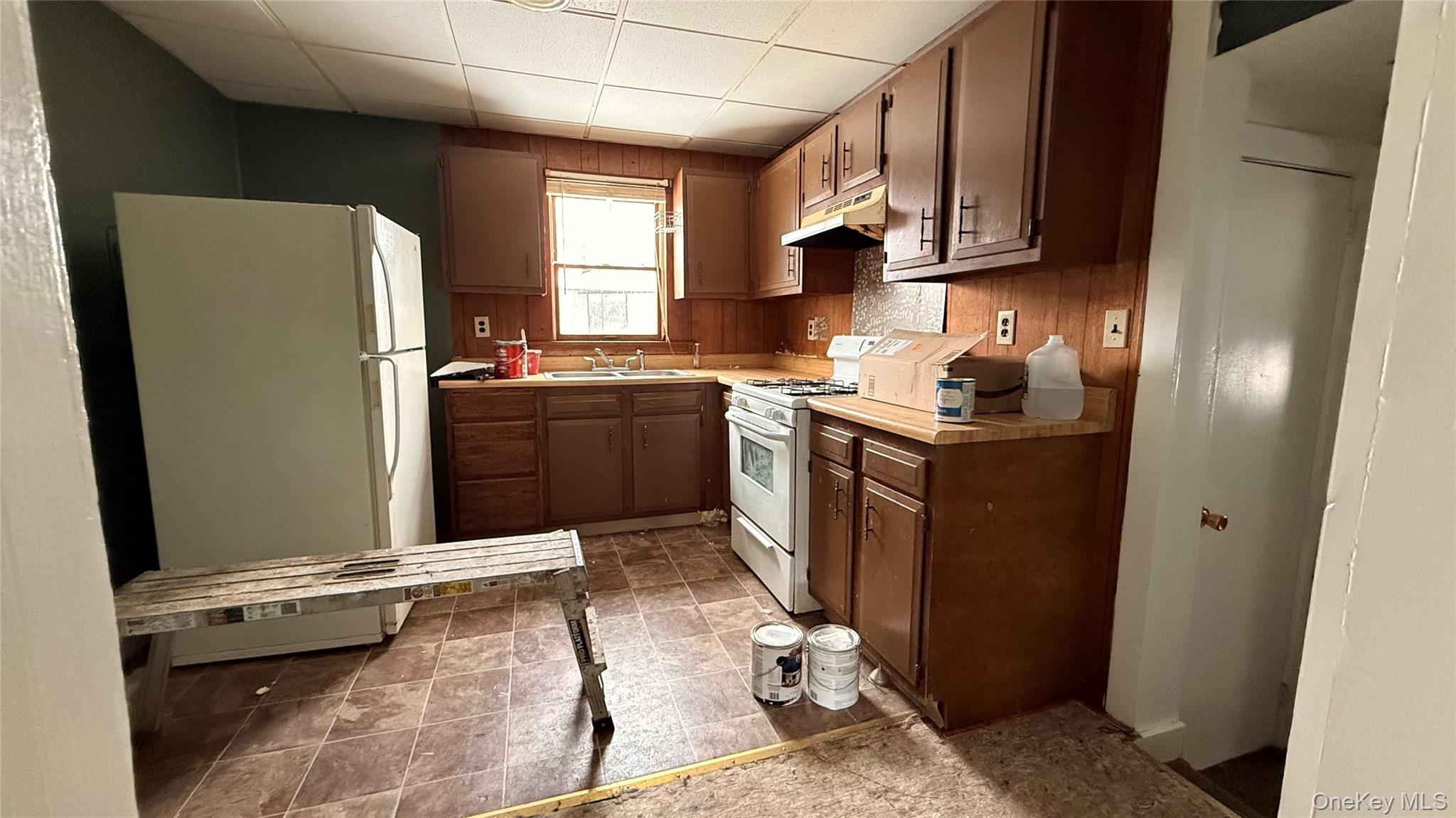 19 Bloomingburg Road Middletown, NY 10940 - Photo 4 of 20 a kitchen with stainless steel appliances granite countertop a refrigerator stove and sink