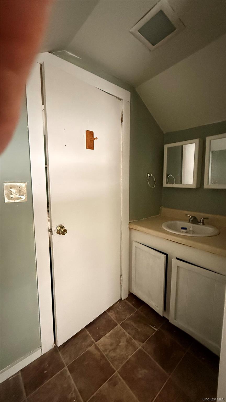 19 Bloomingburg Road Middletown, NY 10940 - Photo 10 of 20 a bathroom with a sink and a mirror