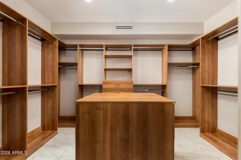 a view of a kitchen with a refrigerator and a refrigerator