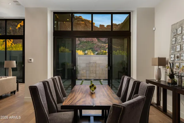 a view of a dining room with furniture window and outside view