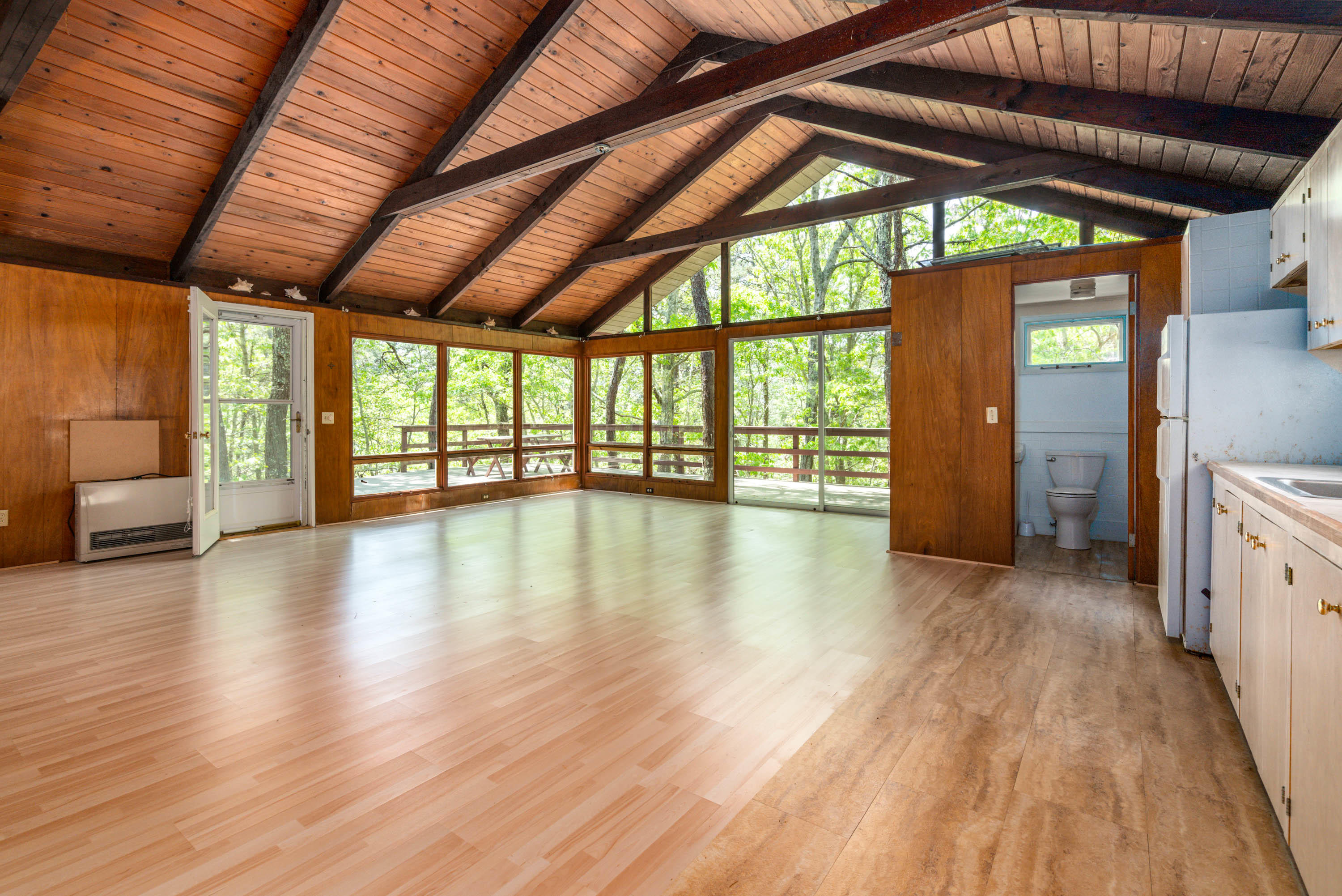120 Aunt Sally's Road Wellfleet, MA 02667 - Photo 18 of 26 a view of an empty room with wooden floor and a window
