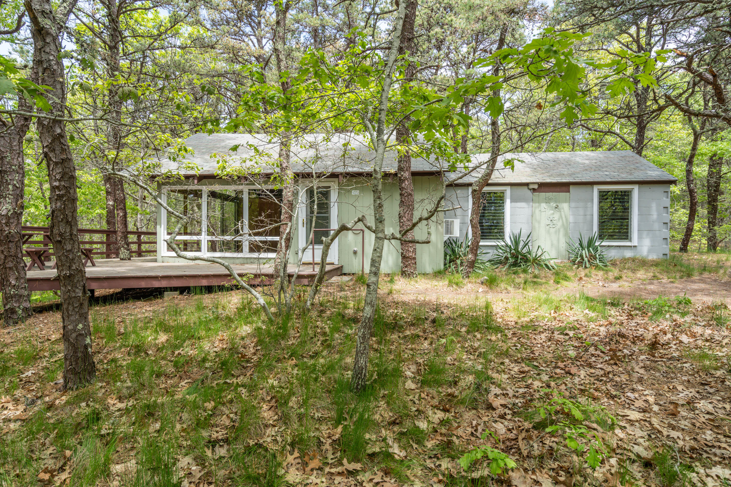 120 Aunt Sally's Road Wellfleet, MA 02667 - Photo 2 of 26 front view of a house with a yard