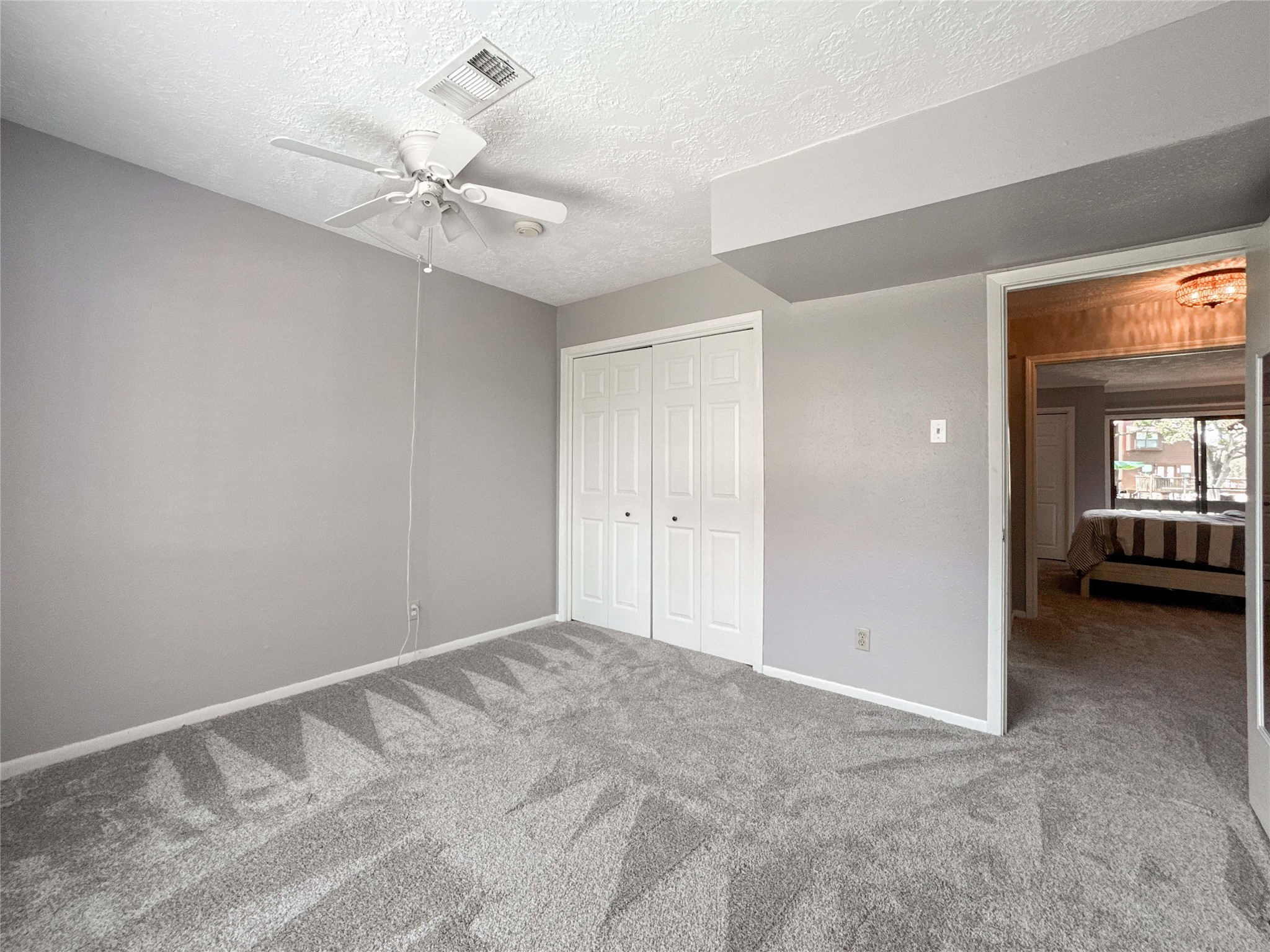 727 Davis Road League City, TX 77573 - Photo 21 of 28 a view of a livingroom with a chandelier fan and wooden floor