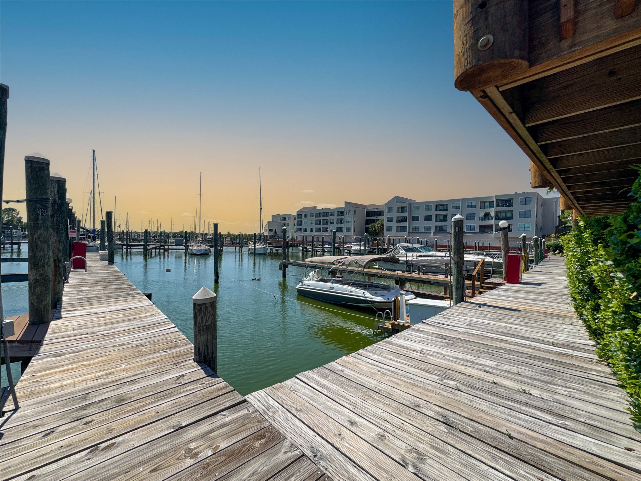 727 Davis Road League City, TX 77573 - Photo 27 of 28 a view of outdoor space with wooden deck and lake