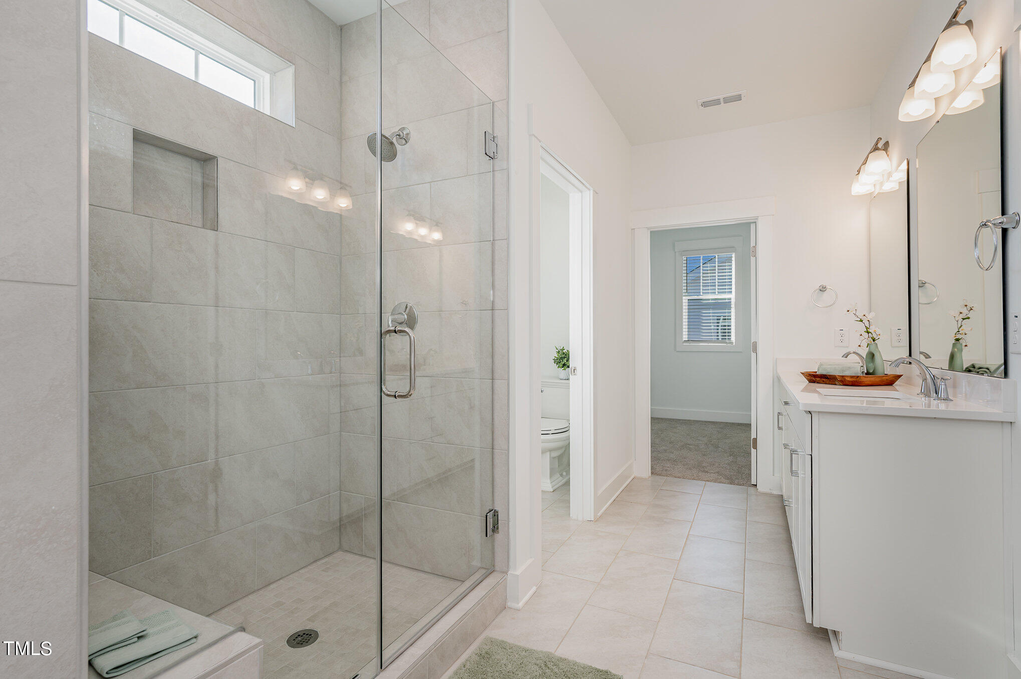 196 DUNLOE Loop Raleigh, NC 27603 - Photo 31 of 43 Master Bathroom with huge walk in closet