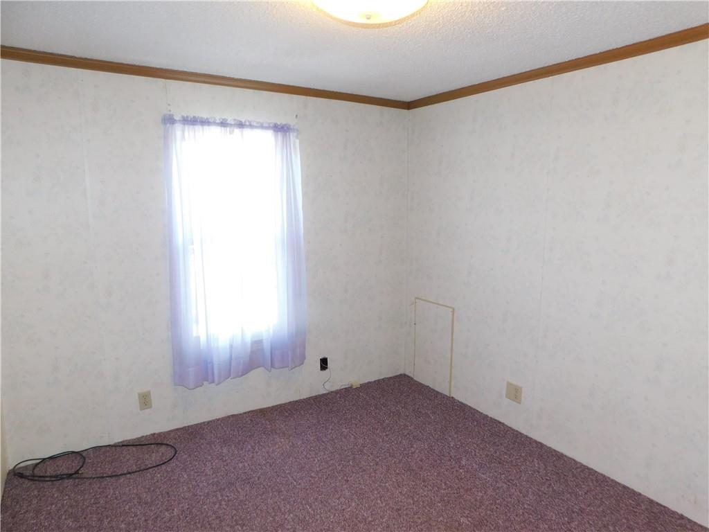 612 Upper Middletown Road Smock, PA 15480 - Photo 12 of 17 an empty room with a window