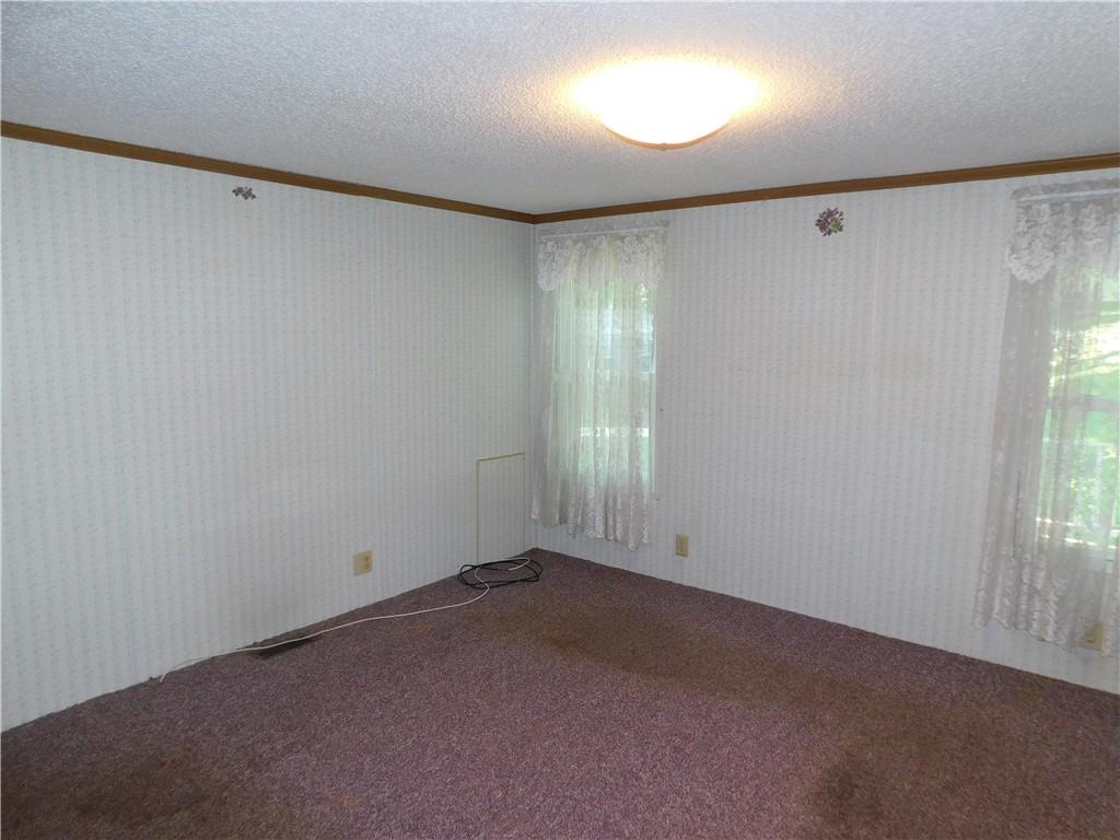612 Upper Middletown Road Smock, PA 15480 - Photo 13 of 17 an empty room with windows