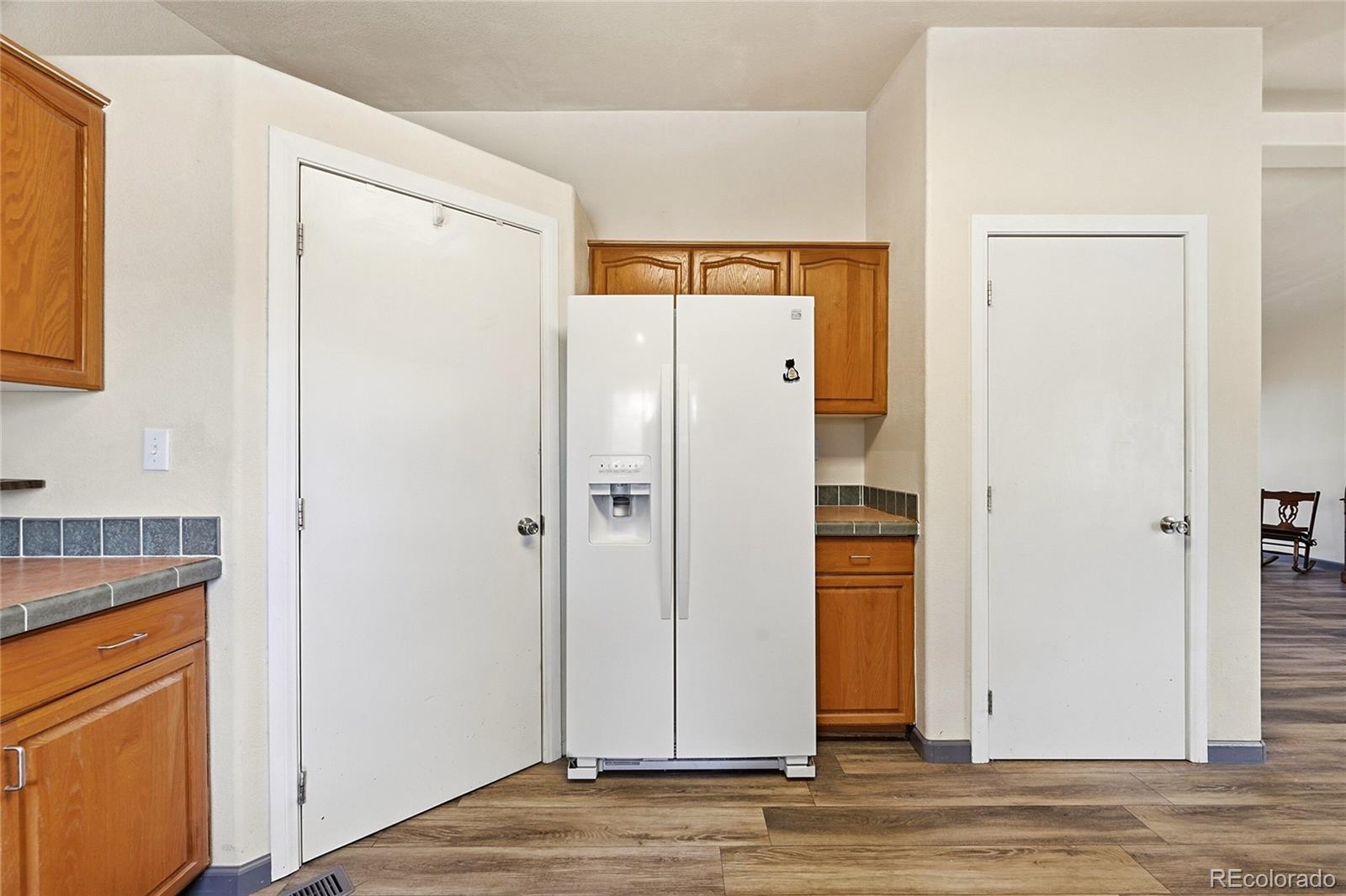 20300 Old Ranch Loop Nathrop, CO 81236 - Photo 7 of 35 a view of a hallway with wooden floor and cabinet