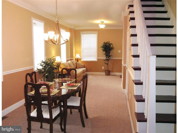 223 Chestnut Street Spring City, PA 19475 - Photo 4 of 11 a dining room with furniture and chandelier