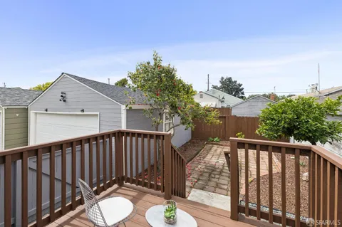 a view of deck and a yard