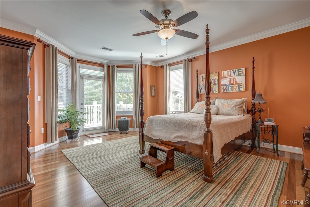 116 Cedar Works Row Richmond, VA 23231 - Photo 11 of 21 a bedroom with a bed and wooden floor