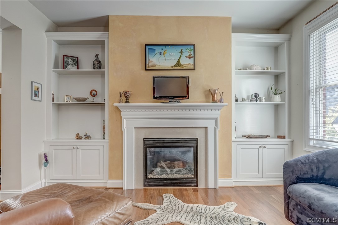116 Cedar Works Row Richmond, VA 23231 - Photo 5 of 21 a living room with furniture and a fireplace