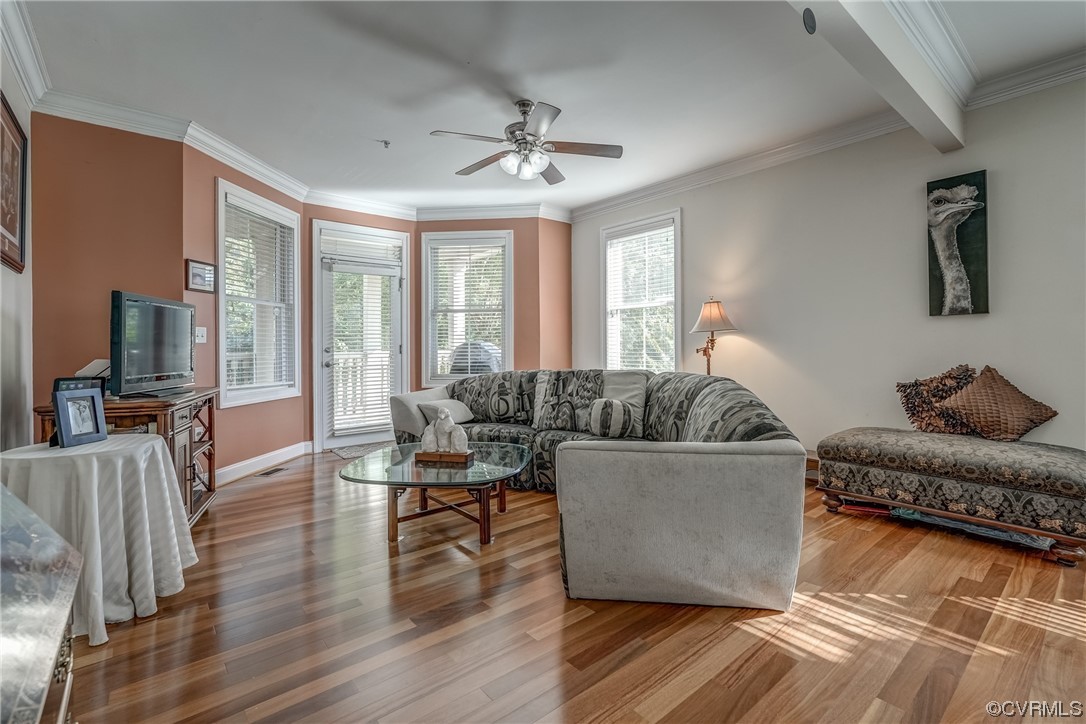 116 Cedar Works Row Richmond, VA 23231 - Photo 8 of 21 a living room with furniture and a flat screen tv