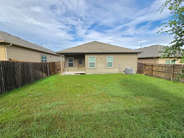 a view of a backyard with a garden