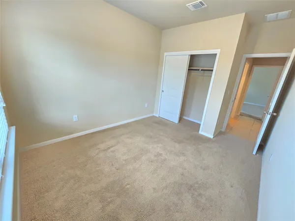 a kitchen with stainless steel appliances a refrigerator and a counter top space