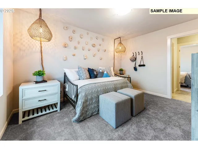 a bedroom with furniture and a chandelier