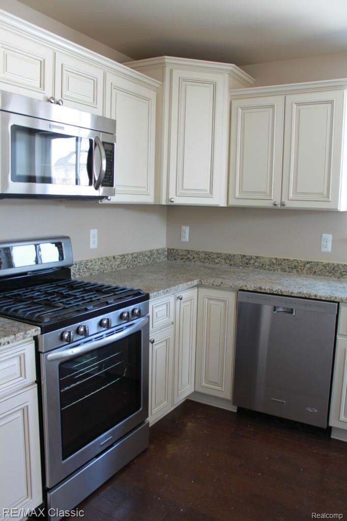5291 Jennings Road Ann Arbor, MI 48105 - Photo 8 of 24 Appliances are in! Gorgeous Hardwood Floors, Upgraded Cabinets w/Soft Close Drawers & Lots of Counter and pantry space!