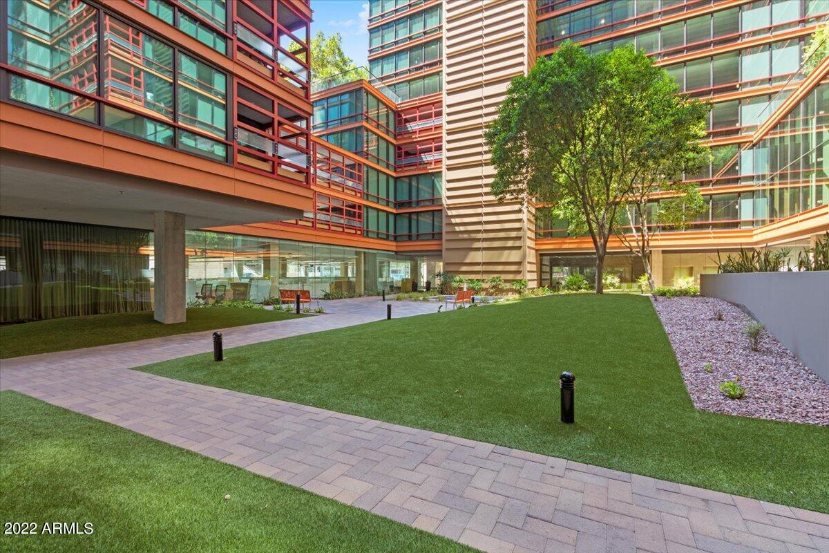 4808 North 24th Street, Unit 1007 Phoenix, AZ 85016 - Photo 12 of 19 a view of a building with a garden