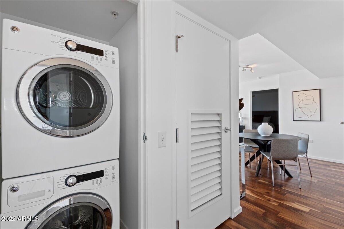 4808 North 24th Street, Unit 1007 Phoenix, AZ 85016 - Photo 13 of 19 a view of a hallway with washer and dryer