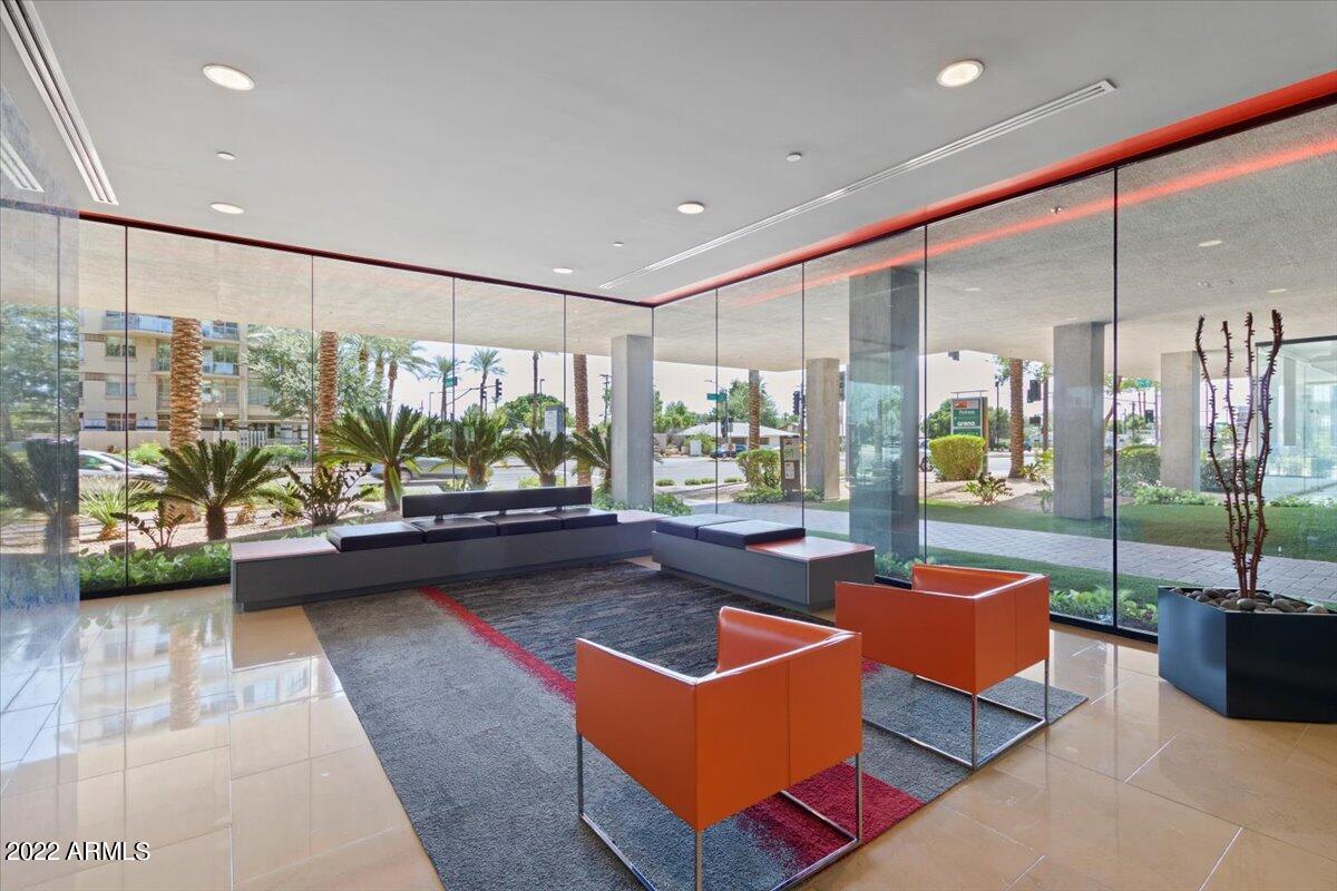 4808 North 24th Street, Unit 1007 Phoenix, AZ 85016 - Photo 15 of 19 a living room with furniture and a large window