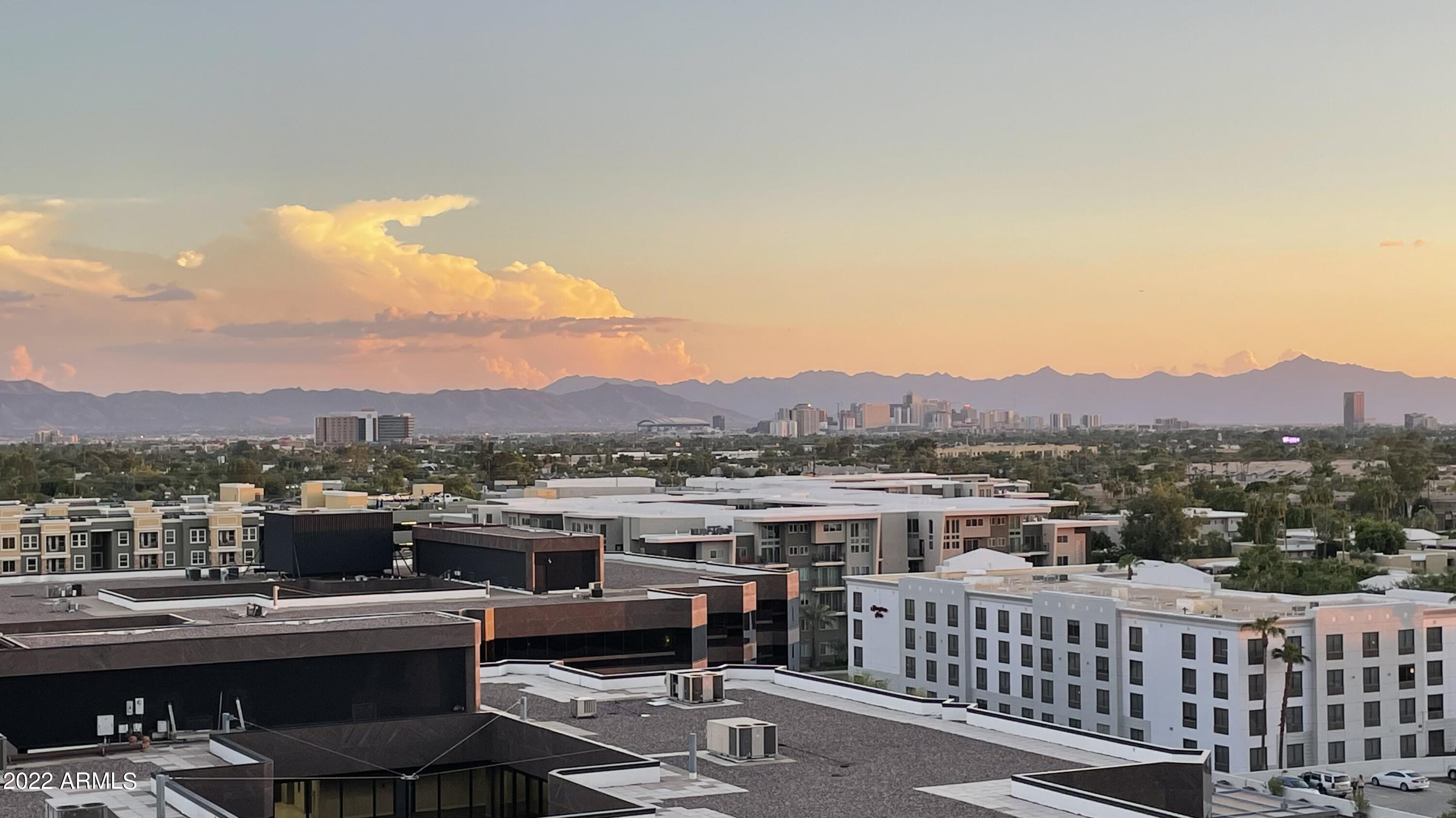 4808 North 24th Street, Unit 1007 Phoenix, AZ 85016 - Photo 19 of 19 a view of a city and a lake
