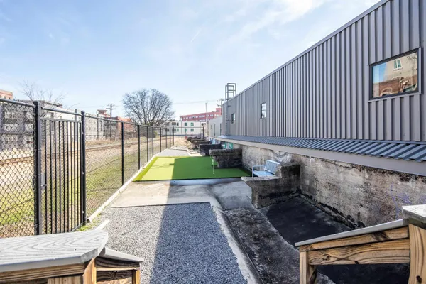 a front view of a building with a street