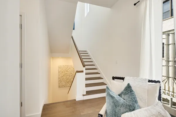 a view of entryway with furniture and rug
