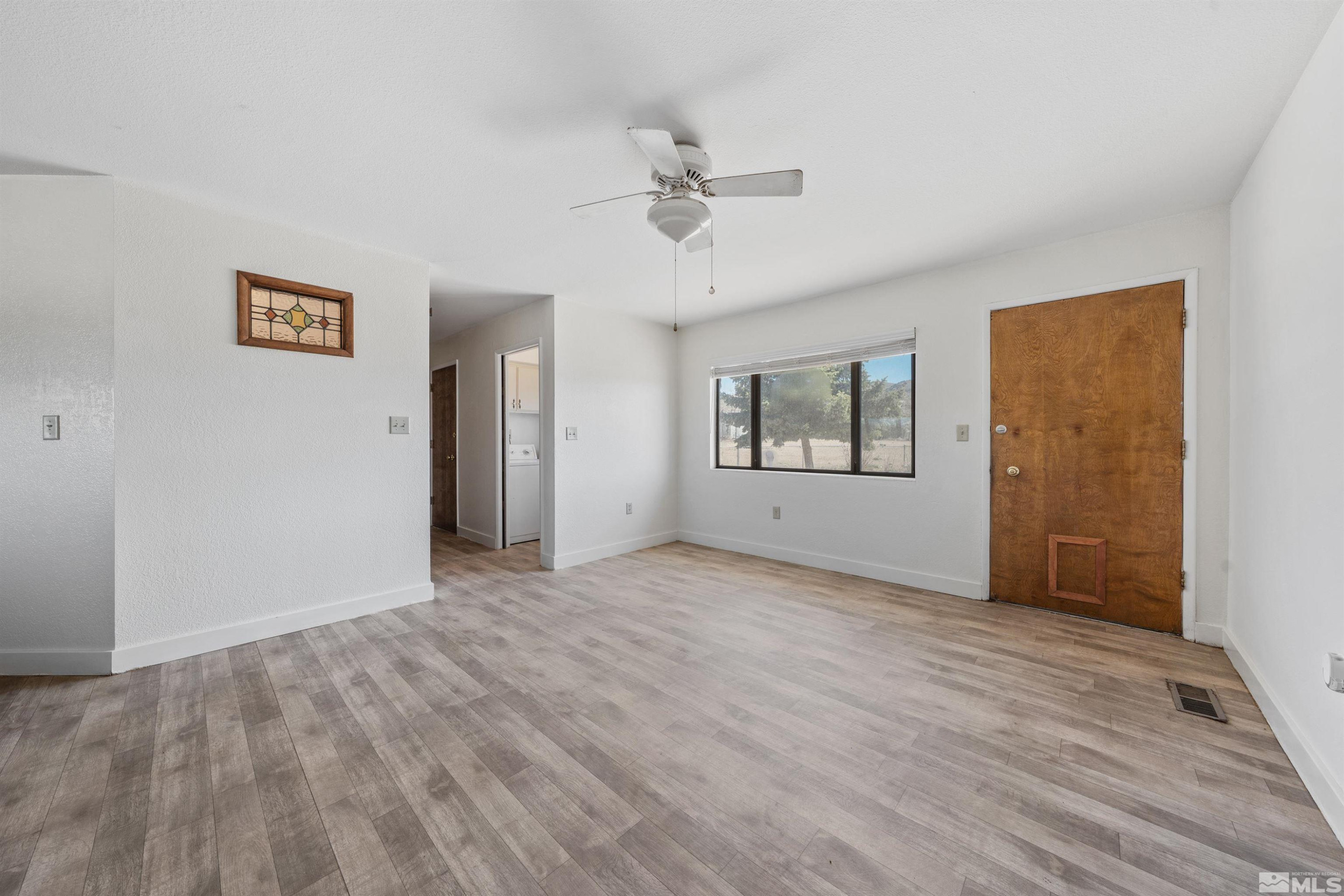 9320 Arrowhead Way Reno, NV 89506 - Photo 12 of 39 a view of an empty room with a window
