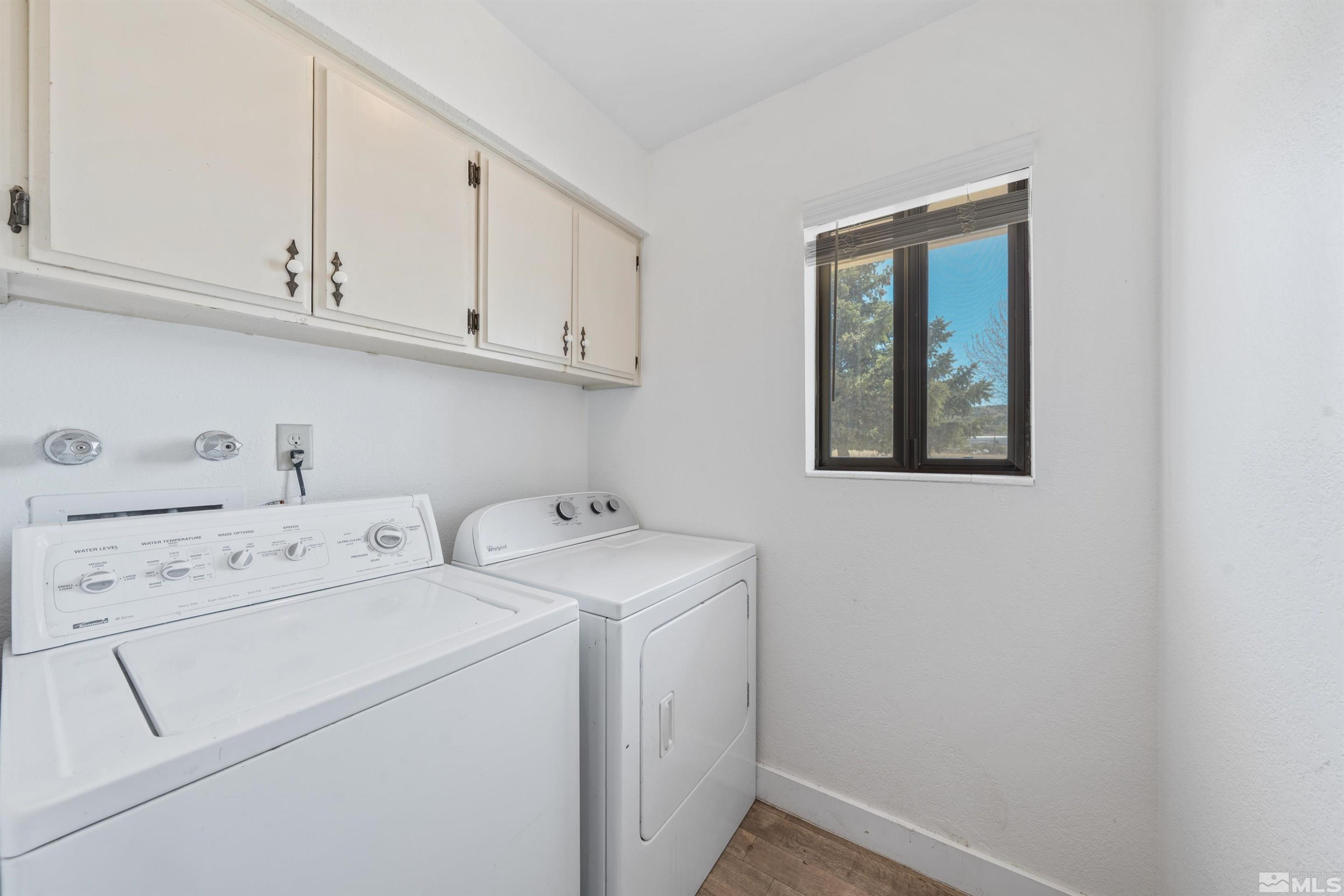 9320 Arrowhead Way Reno, NV 89506 - Photo 16 of 39 a view of storage and utility room with washer and dryer