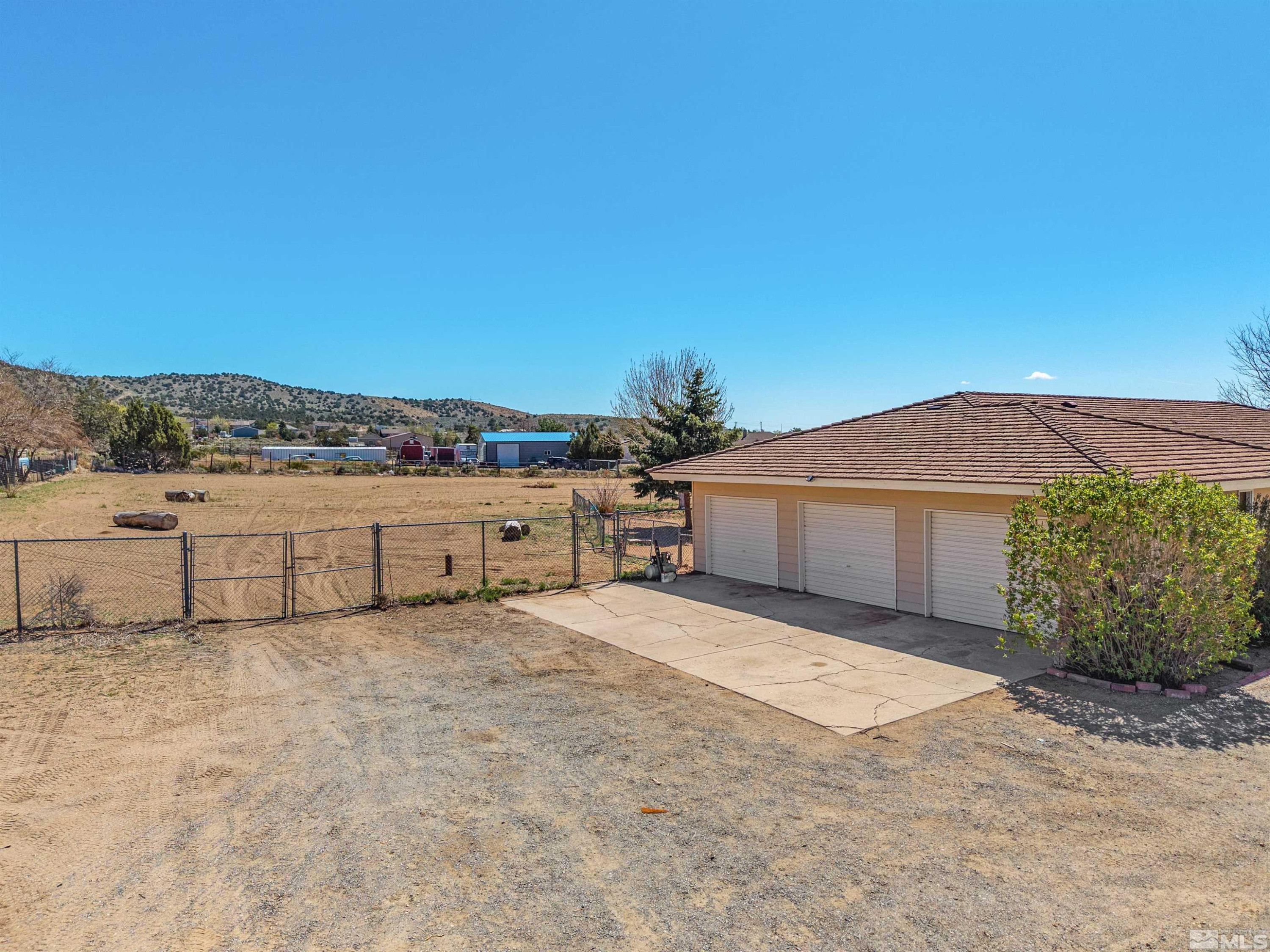 9320 Arrowhead Way Reno, NV 89506 - Photo 39 of 39 a view of a house with a yard