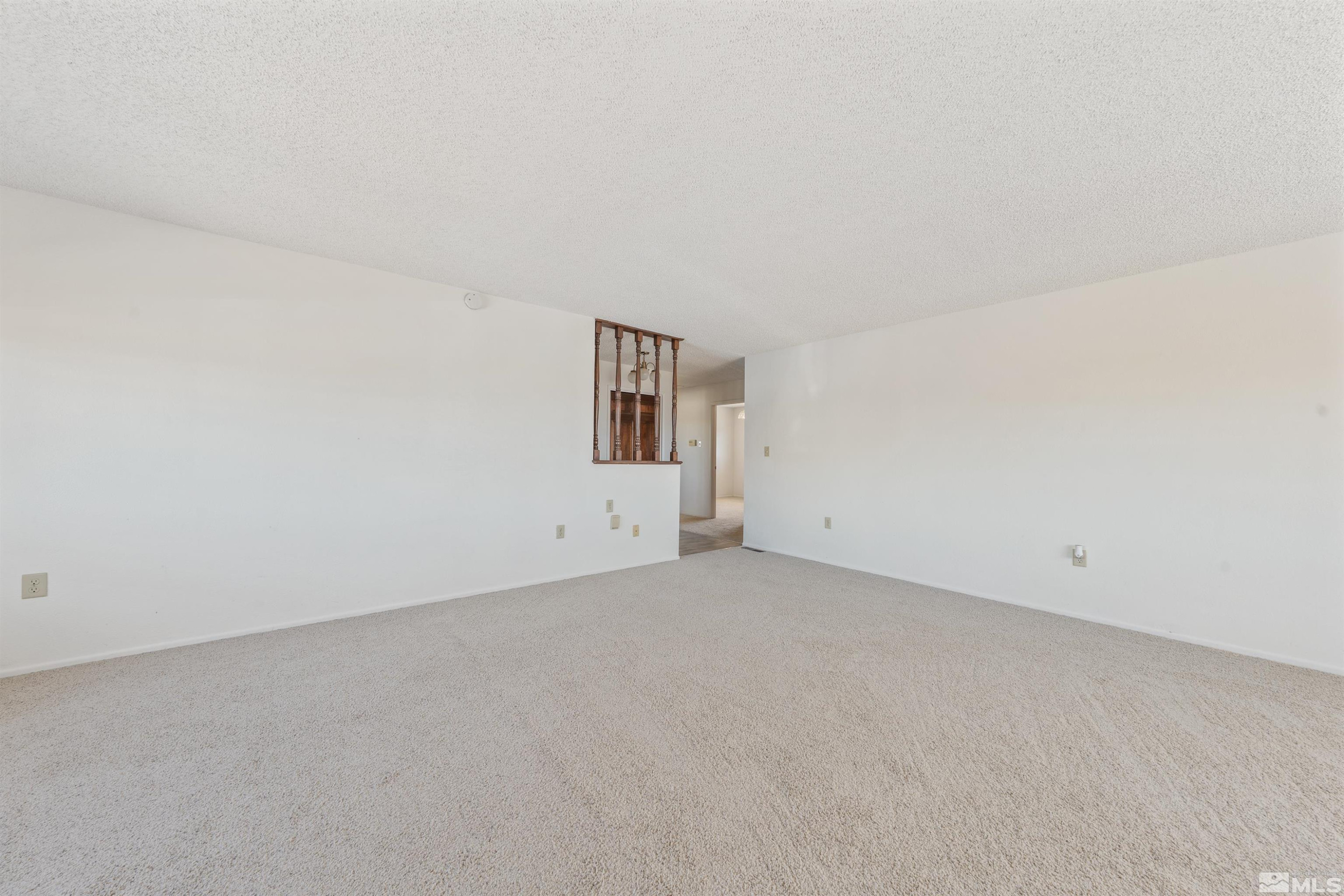 9320 Arrowhead Way Reno, NV 89506 - Photo 7 of 39 an empty room with windows