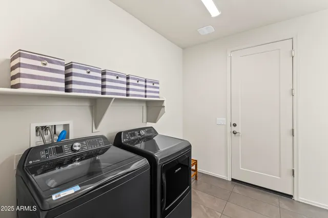a bathroom with a sink and a mirror with toilet
