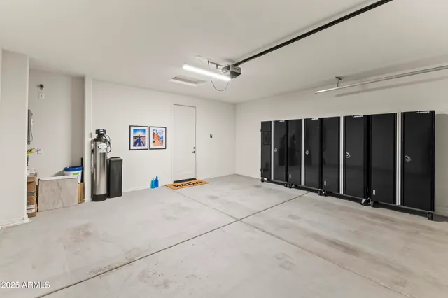 a view of a workspace room with furniture and wooden floor