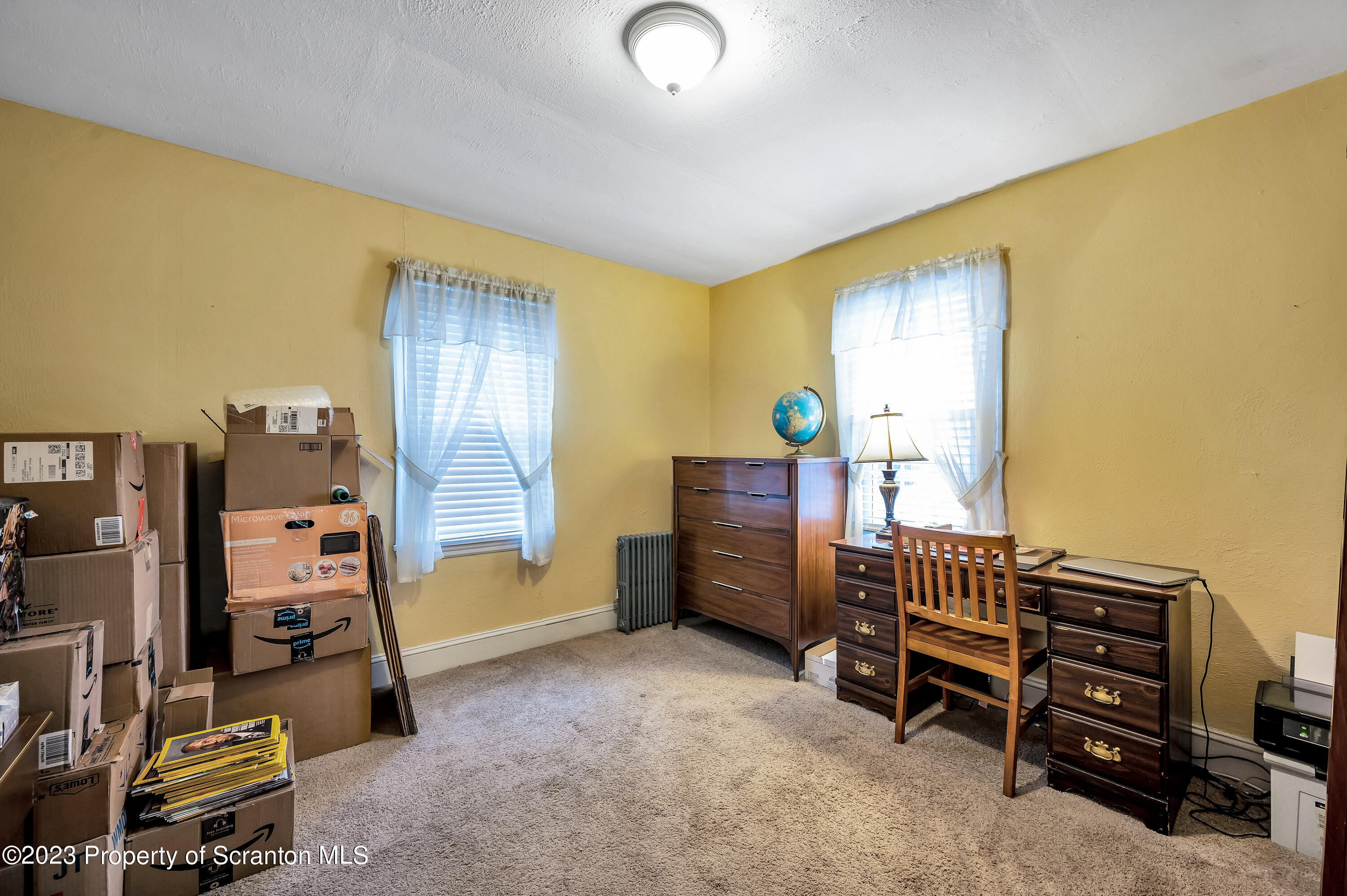 709 Meade Street Throop, PA 18512 - Photo 18 of 37 a view of a bedroom with workspace