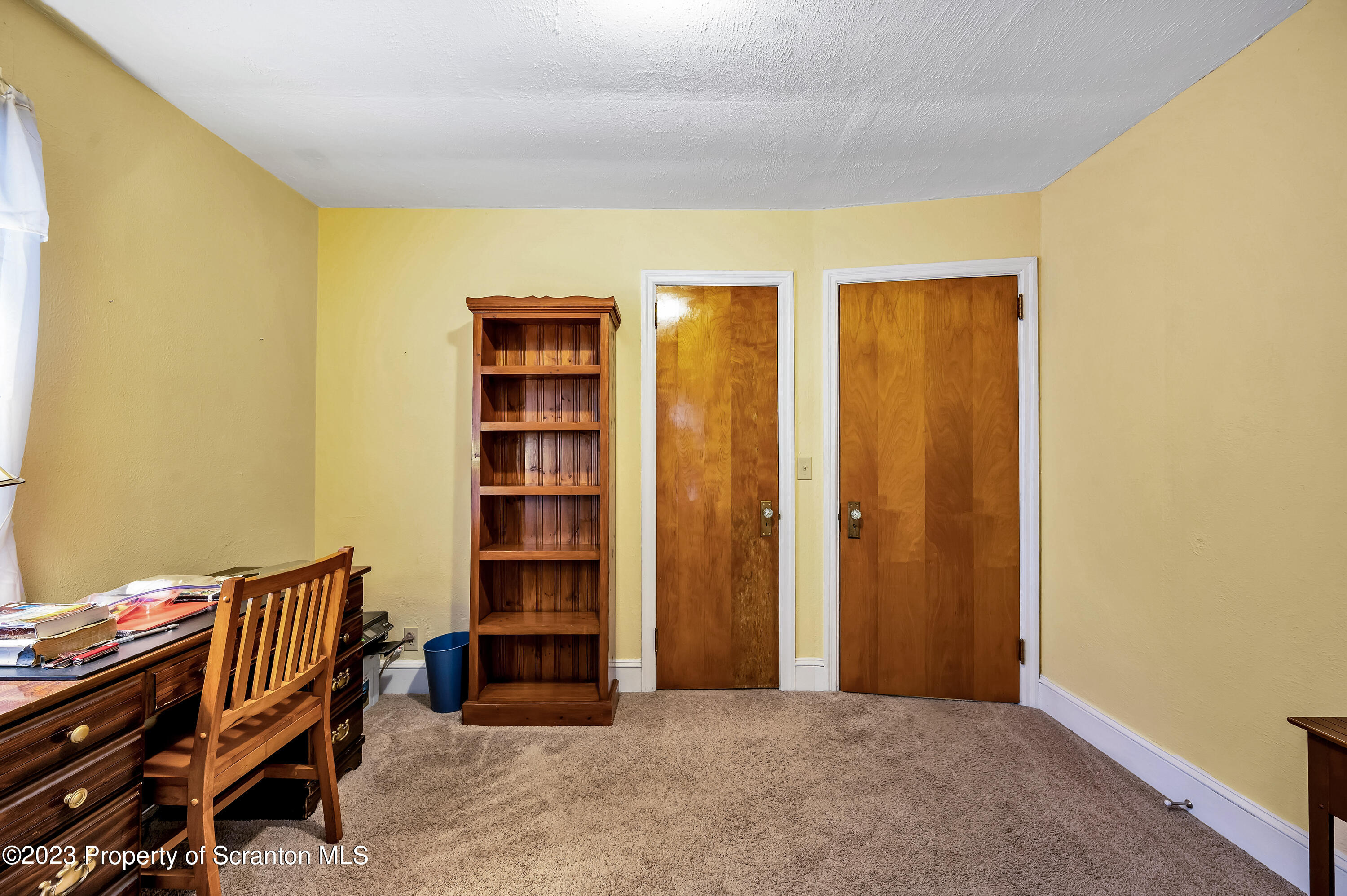 709 Meade Street Throop, PA 18512 - Photo 20 of 37 a view of room with stairs and furniture