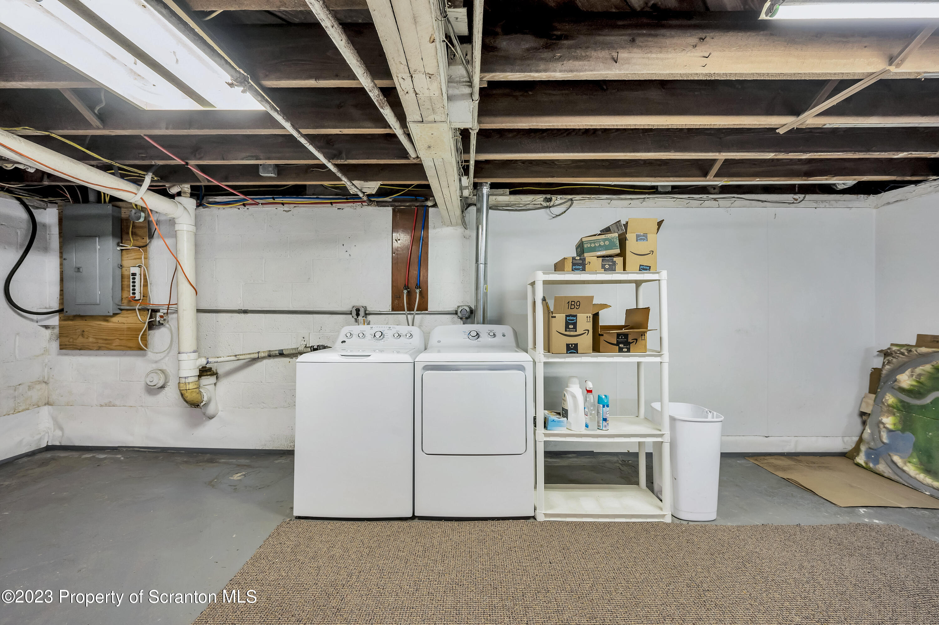 709 Meade Street Throop, PA 18512 - Photo 26 of 37 a utility room with dryer and washer