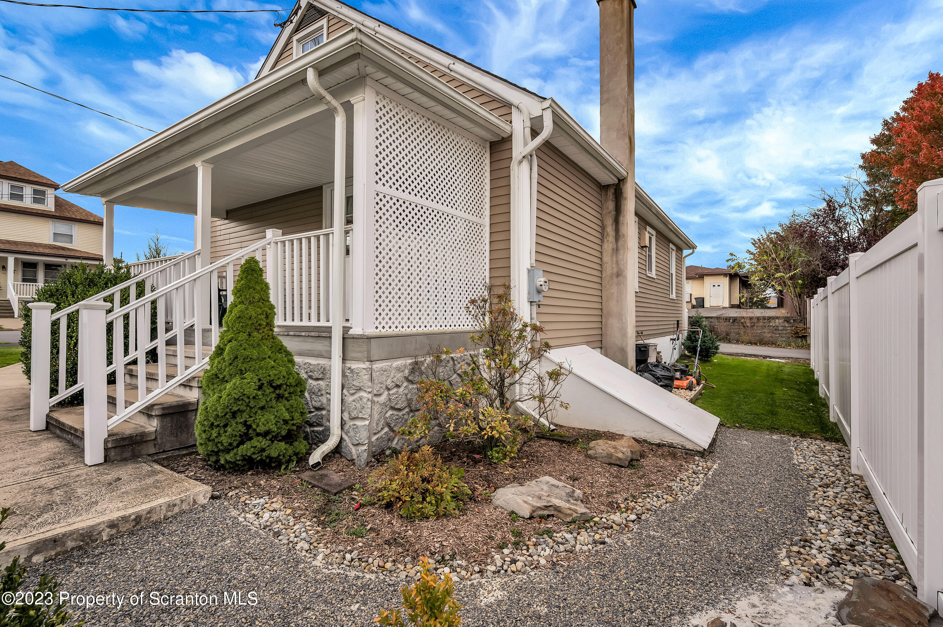 709 Meade Street Throop, PA 18512 - Photo 34 of 37 a view of a house with a yard