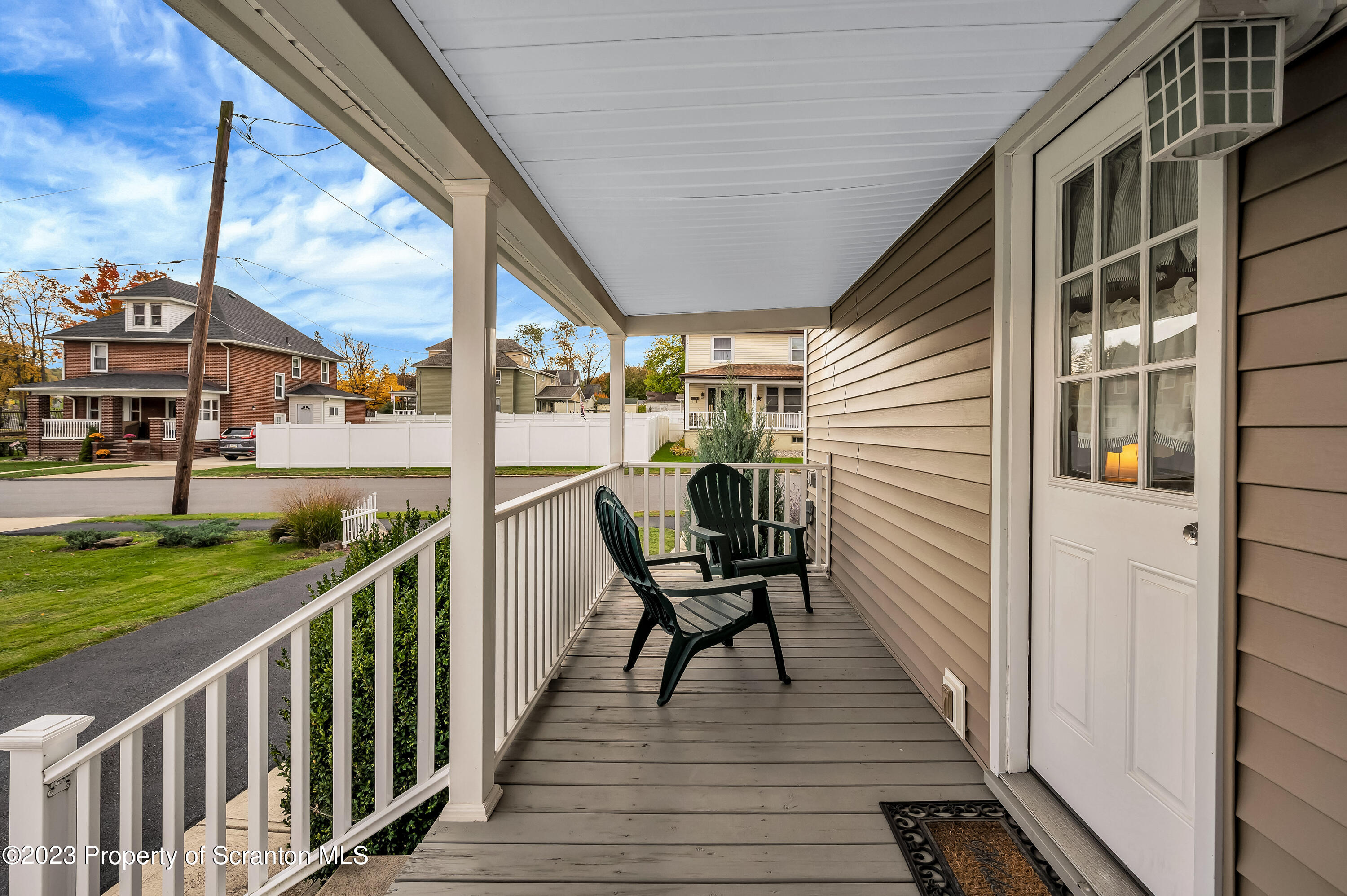 709 Meade Street Throop, PA 18512 - Photo 35 of 37 a view of a deck with chairs and wooden floor