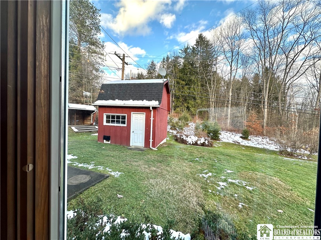 2246 Johnson Road Olean, NY 14760 - Photo 15 of 43 View of backyard from sunroom