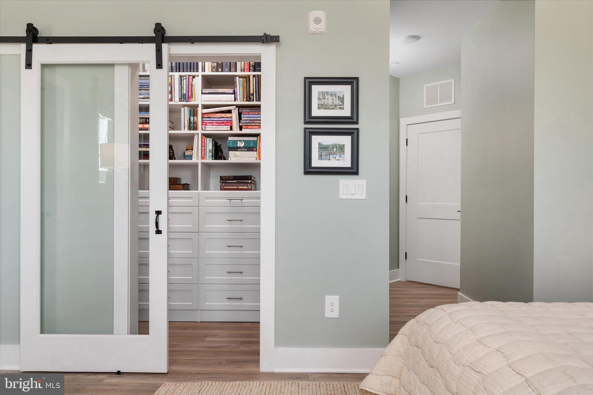 a bedroom with a bed and closet