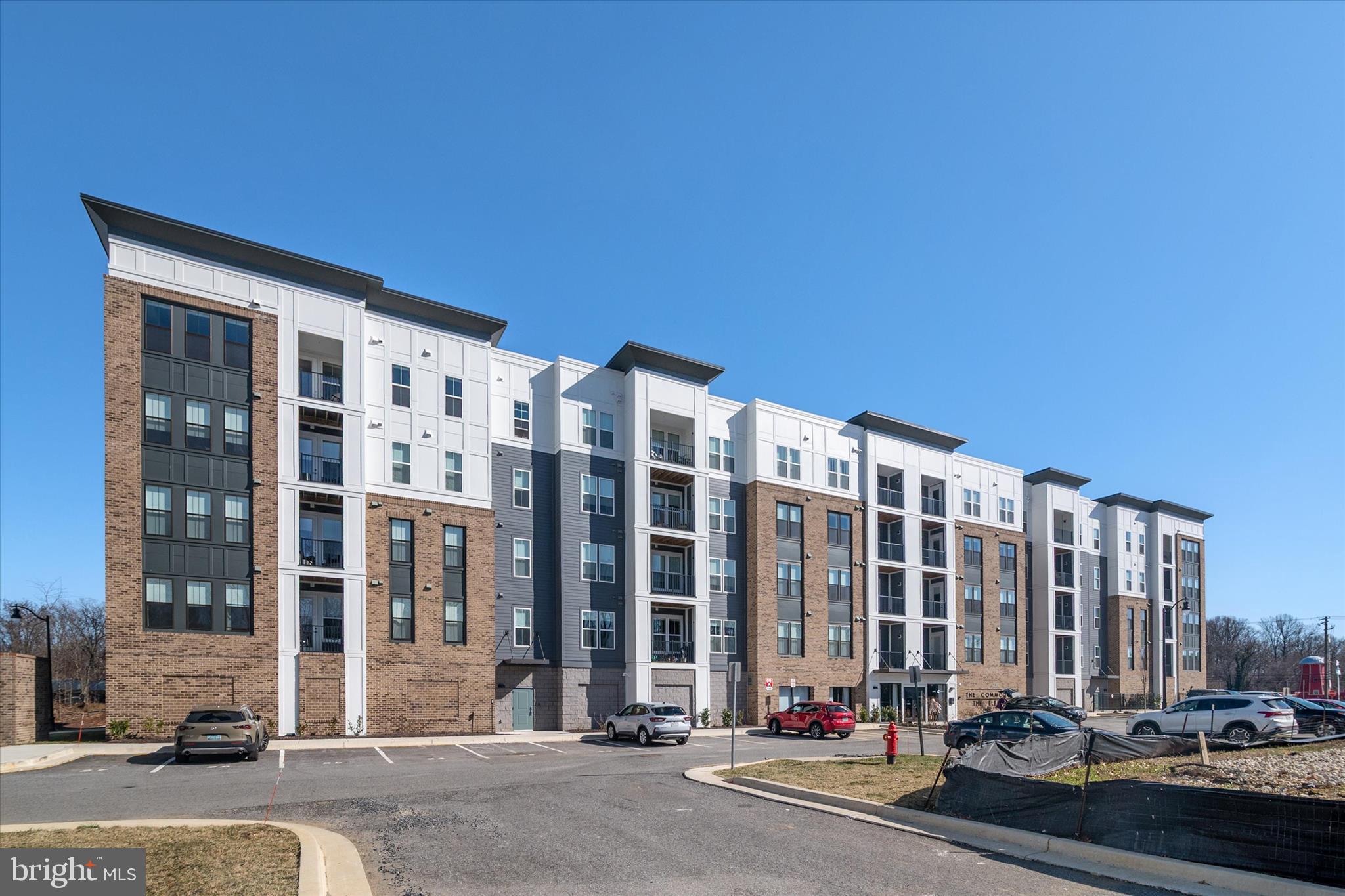 78 Old Mill Bottom Road North, Unit 211 Annapolis, MD 21409 - Photo 2 of 37 a city street lined with tall buildings
