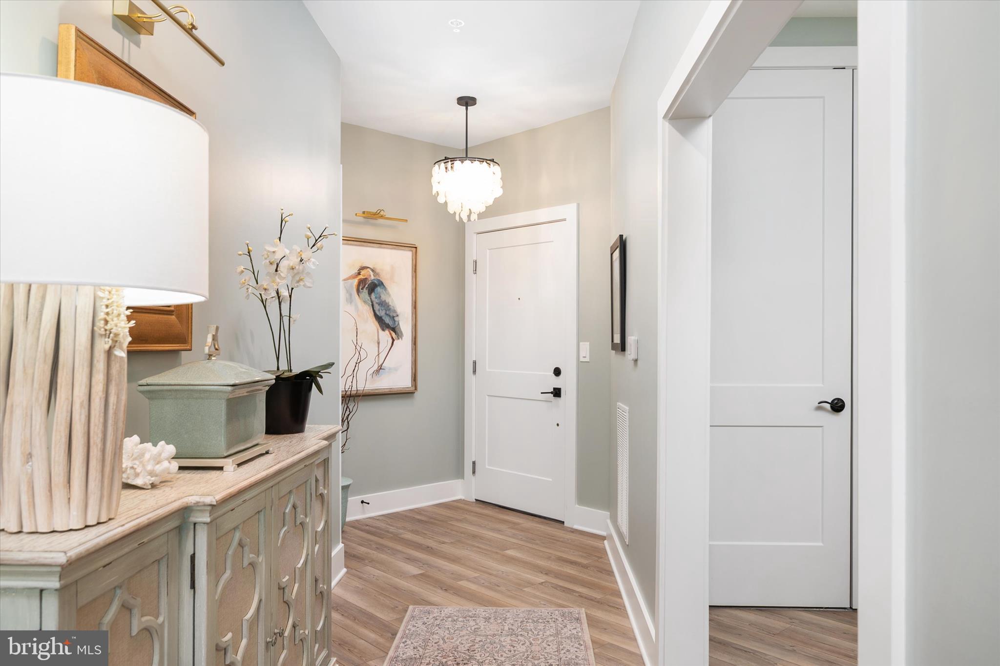 78 Old Mill Bottom Road North, Unit 211 Annapolis, MD 21409 - Photo 3 of 37 a bathroom with a sink a mirror and shower