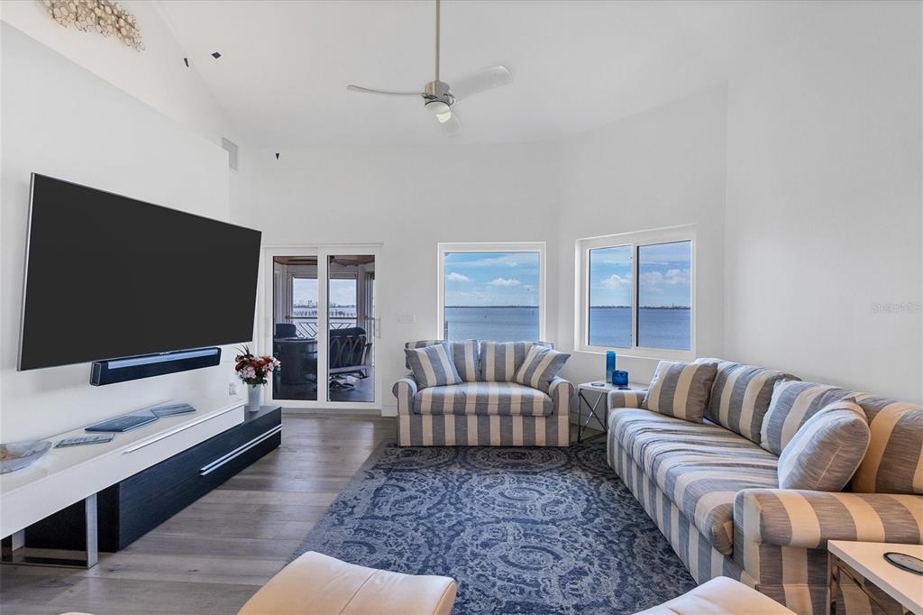 11000 Placida Road, Unit 104 Placida, FL 33946 - Photo 10 of 38 Living room has magnificent views of the Intracoastal