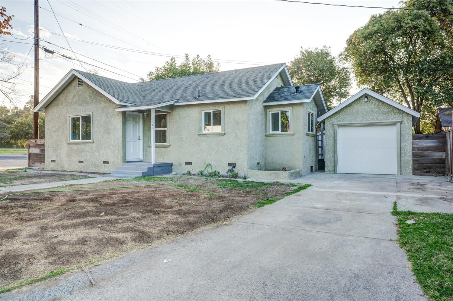 2520 P Street Merced, CA 95340 - Photo 3 of 23 a view of a house with a yard