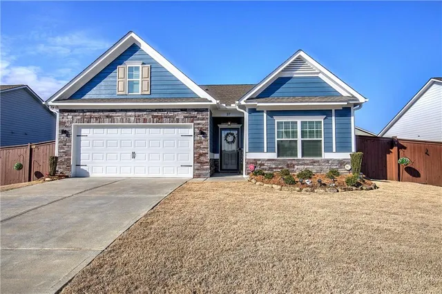 front view of a house with a yard