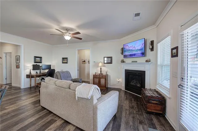 a view of a bathroom with a glass shower door and a mirror